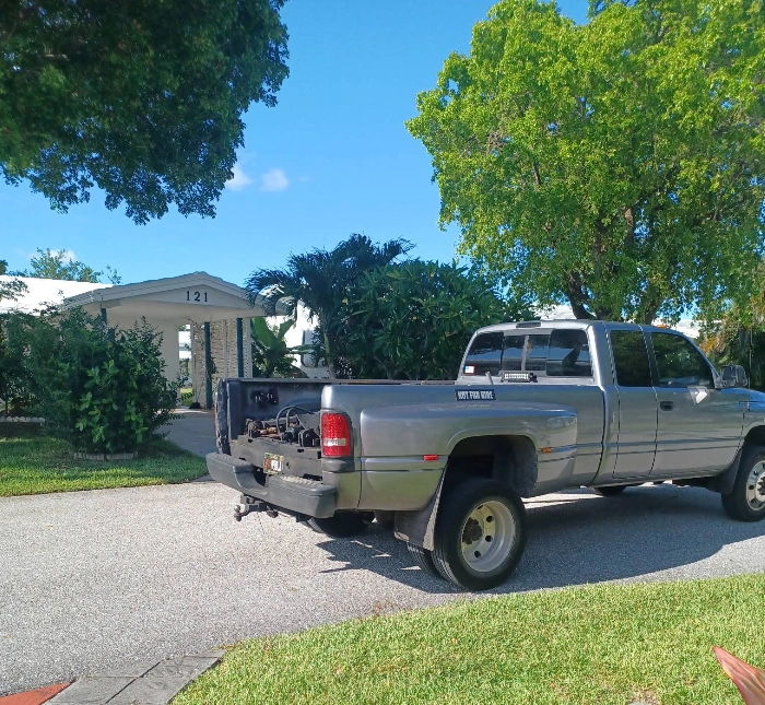 Silver Dodge Ram dually pickup truck, an example of how many miles a car can last with proper upkeep