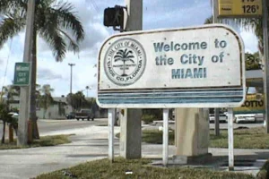 Welcome to the City of Miami sign promoting local junk car buyer Miami.
