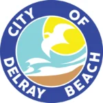 Circular logo of Delray Beach with a seagull, waves, sun, and beach promoting we buy junk cars Delray Beach