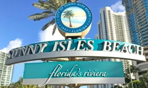 Sign for Sunny Isles Beach promoting Hercules' We buy junk cars in Sunny Isles Beach